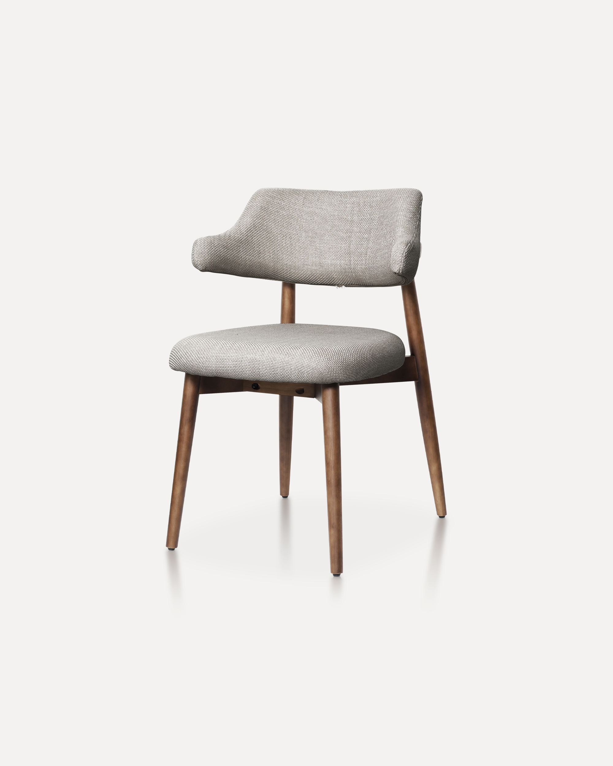 Warm earthy tone mid-century inspired padded armchair
